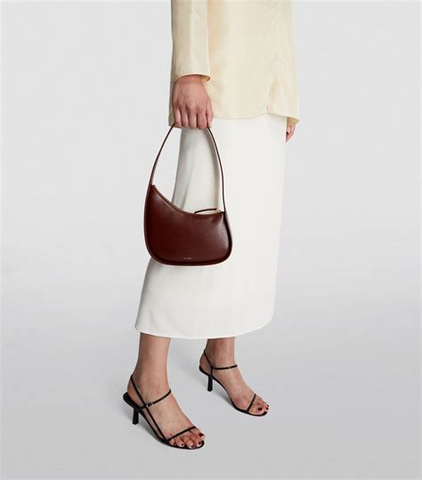 the row mid moon bag